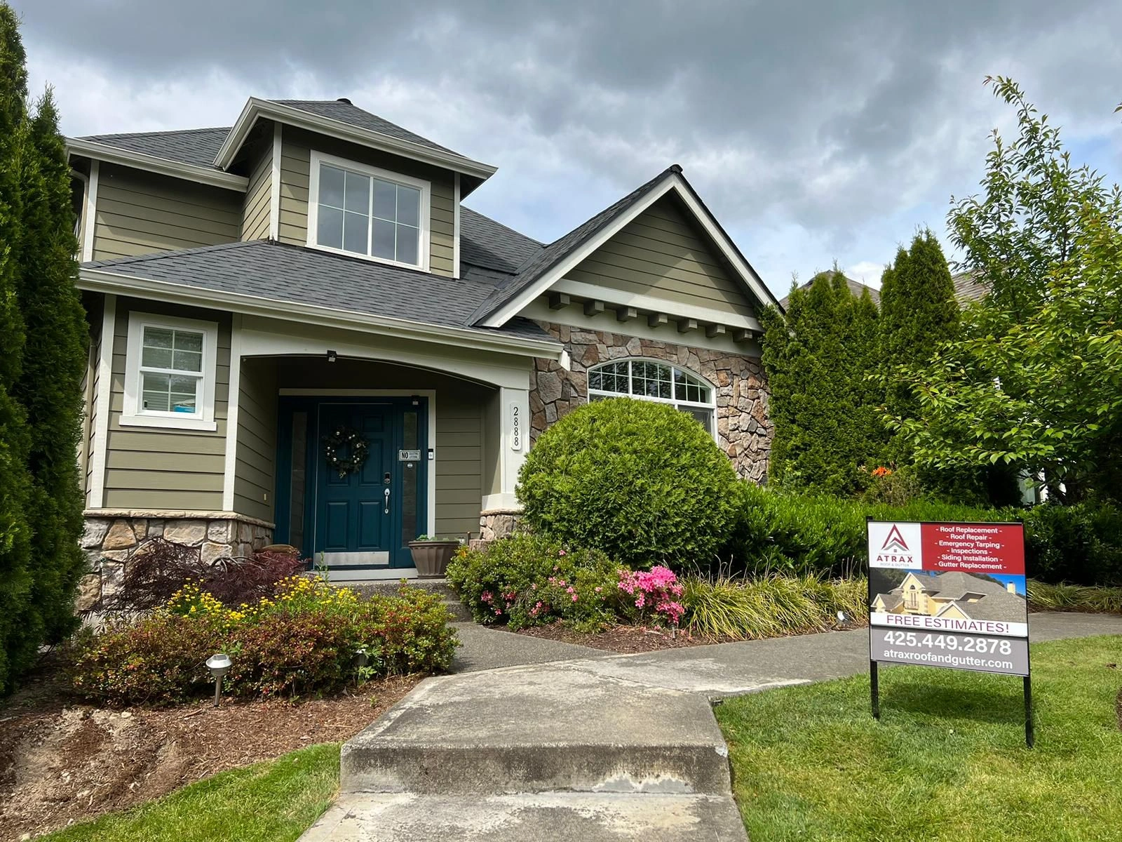 Atrax Roofing team performing roof replacement in Kirkland WA
